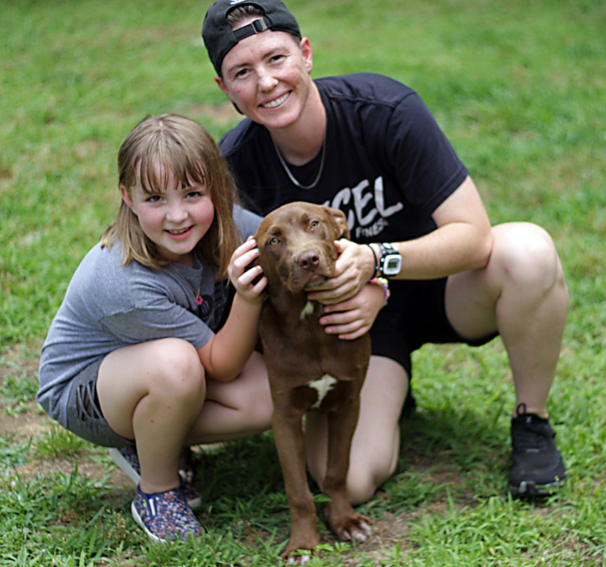 Clove basked in the focus of Socialization Volunteers at the Animal Adoption Center of Blount County in Cleveland, Alabama. Photo by Kristin Yarbrough