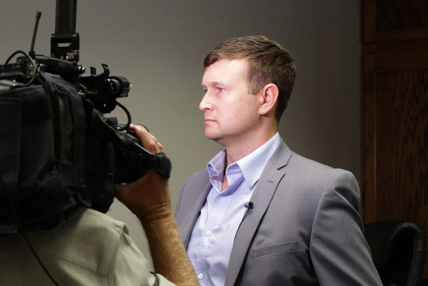 Blount County Commission Chairman Bradley Harvey takes questions from Birmingham news media after the vote. Photo by Kristin Yarbrough.